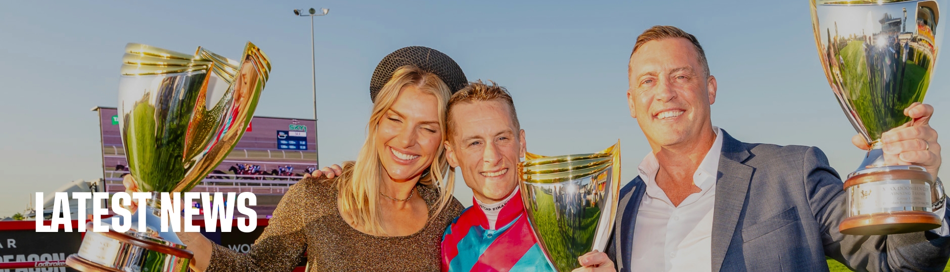 Tony Gollan celebrates the Doomben Cup